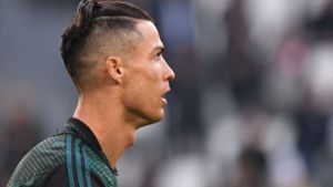 Fußballspieler Cristiano Ronaldo mit neuer Frisur. Foto: AFP/MARCO BERTORELLO