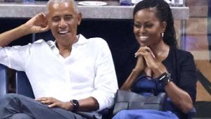 Barack und Michelle Obama hatten sichtlich Freude bei ihrem US-Open-Besuch. Foto: imago/ABACAPRESS