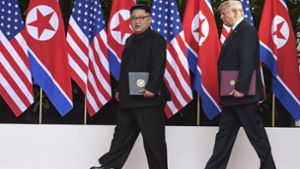 Donald Trump und der nordkoreanische Machthaber Kim Jong Un wollen sich erneut treffen (Archivbild). Foto: AFP POOL via AP