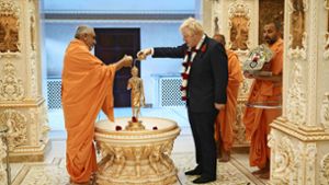 Premierminister Boris Johnson zu Besuch in einem Hindu-Tempel in London Foto: AFP/YUI MOK