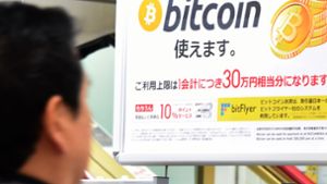 In Asien sind Bitcoin und Co. sehr beliebt – hier ein Bild aus Tokio. Foto: AFP