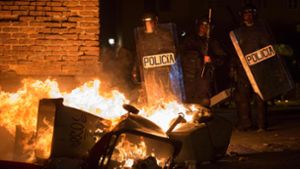 Nach dem Tod eines Afrikaners bei einer Polizeiaktion gegen illegalen Straßenhandel ist es im Herzen von Madrid zu Ausschreitungen gekommen. Foto: AFP