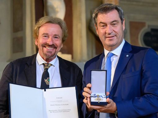 Thomas Gottschalk neben dem bayerischen Ministerpräsidenten Markus Söder (r.). Foto: imago images/Sven Simon