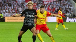 Der SC Freiburg im Spiel gegen RC Lens. Foto: AFP/FRANCOIS LO PRESTI
