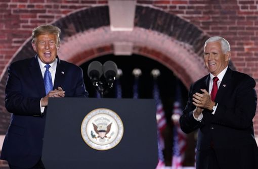 Mike Pence (rechts) wird erneut Vizepräsident, wenn Donald Trump die Wahl gewinnt. Foto: AP/Andrew Harnik