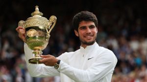 Carlos Alcaraz hat in Wimbledon gewonnen. Foto: AFP/ADRIAN DENNIS