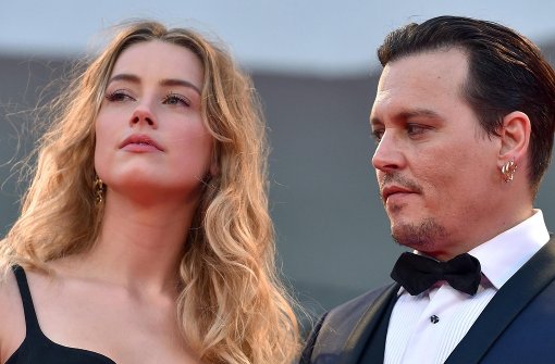 Amber Heard und Johnny Depp haben sich außergerichtlich geeinigt. Foto: dpa