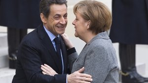 Nicolas Sarkozy und Angela Merkel treffen am Montag aufeinander. Foto: dpa