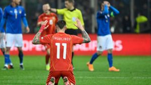 Darko Churlinov hofft mit Nordmazedonien nach dem Coup gegen Italien auf die WM-Qualifikation – mit einem weiteren Coup in Portugal. Foto: AFP/ALBERTO PIZZOLI