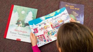 Bücher sind eine Möglichkeit, Kindern zu vermitteln, worauf es in einer solidarischen Gemeinschaft ankommt. Foto: dpa/Patrick Pleul
