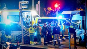 Polizisten am Tatort: In Brüssel sind am Montagabend zwei Menschen getötet worden. Foto: dpa/Hatim Kaghat
